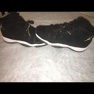 Jordan retro 11s Black n gold